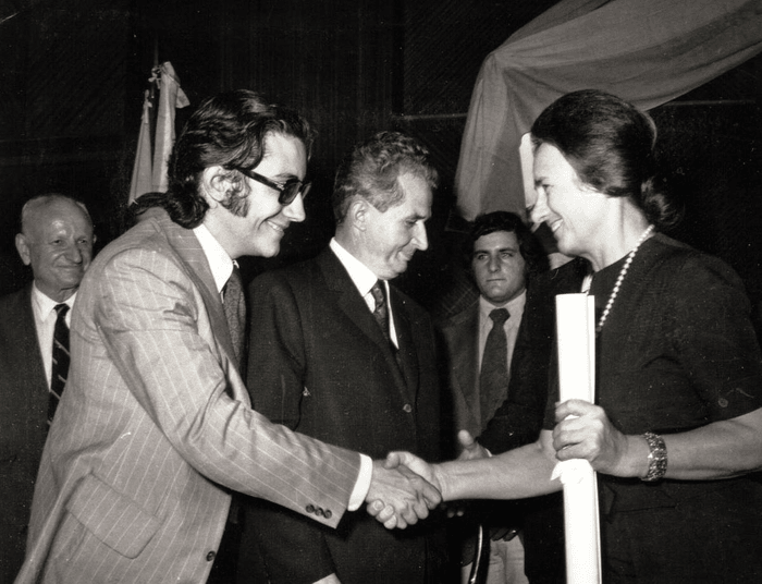 Elena Ceausescu receiving a honorary doctorate